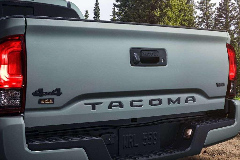 Tailgate on gray 2022 Toyota Tacoma, highlighting release date and price of 2023 Toyota Tacoma
