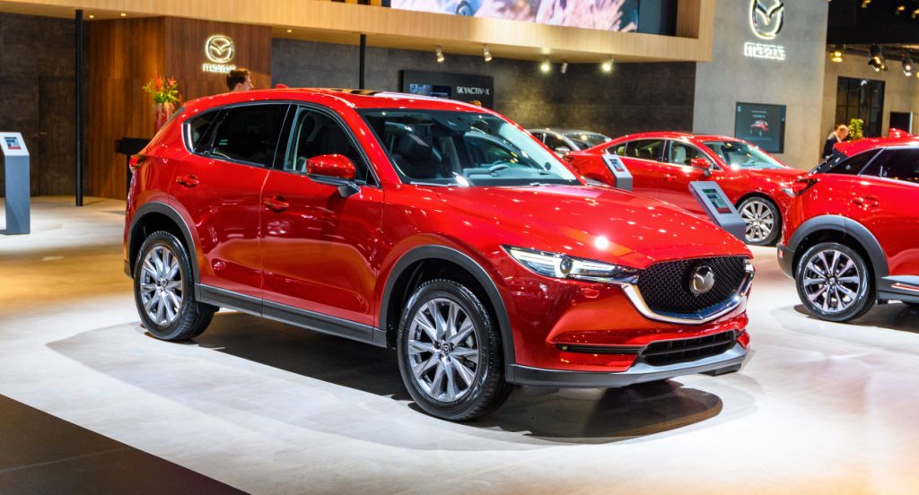 A red 2022 Mazda CX-5 is on display.