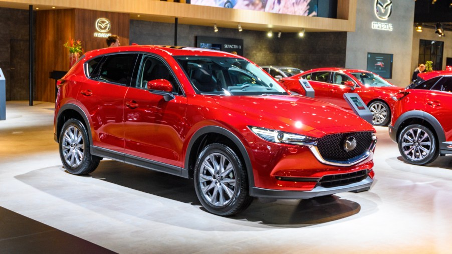 A red 2022 Mazda CX-5 is on display.