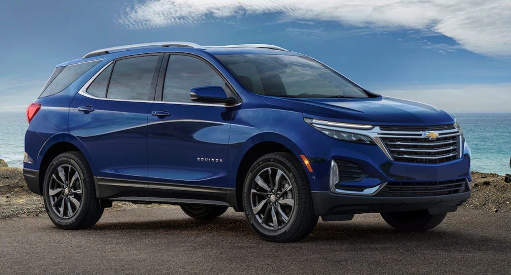 A blue 2022 Chevrolet Equinox compact SUV is parked.