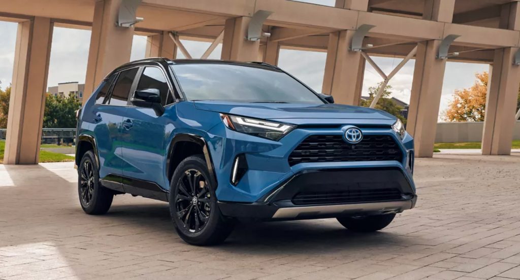A blue 2022 Toyota RAV4 Hybrid XSE is parked, would lane-keep assist benefit from an inflatable steering wheel?