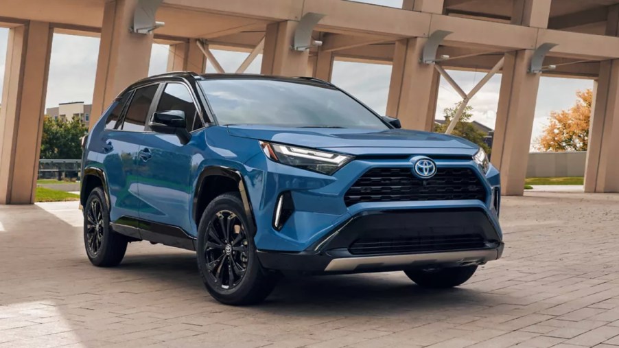 A blue 2022 Toyota RAV4 Hybrid XSE is parked.