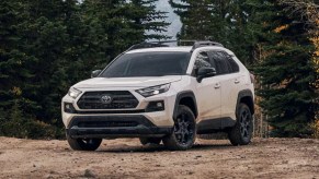 A white 2022 Toyota RAV4 XLE Premium compact SUV is parked outdoors.