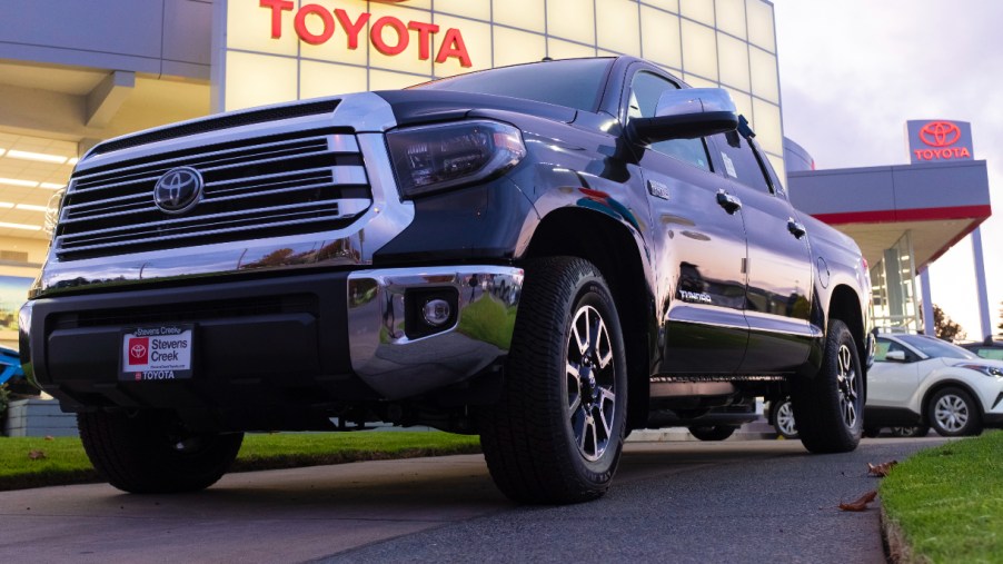A gray Toyota Tundra pickup truck is parked.