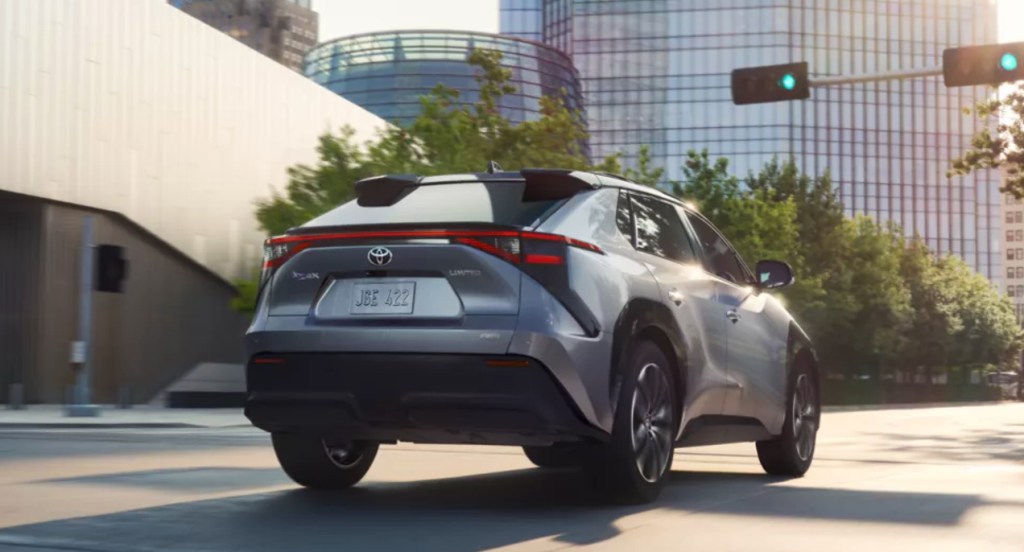 The back of a silver 2023 Toyota bZ4X electric SUV.