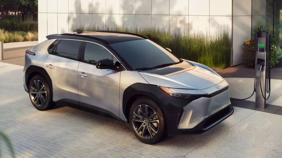 A silver 2023 Toyota bZ4X electric SUV is parked.