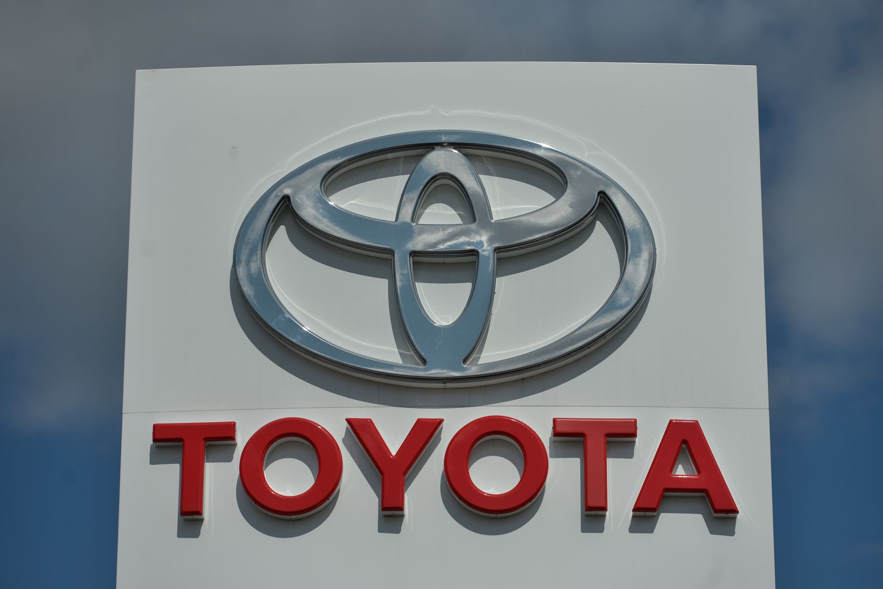 The Toyota logo on a dealership sign in South Edmonton, Alberta, Canada