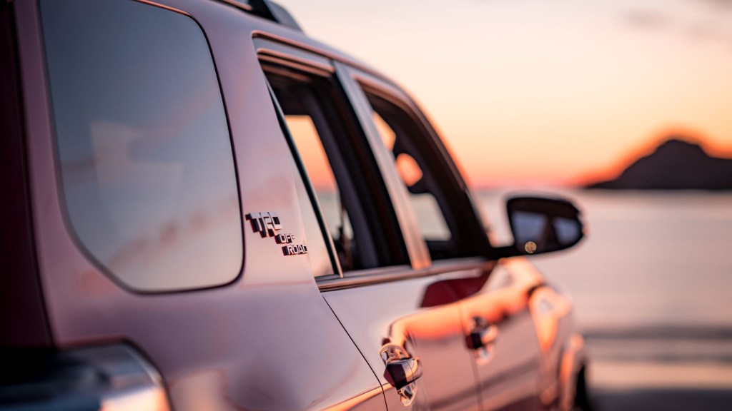 A side view of a Toyota SUV with TRD Off-Road badging.