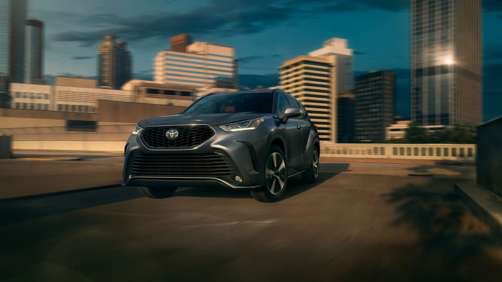 A Toyota Highlander Hybrid SUV in a parking garage.