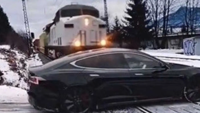 Train vs Tesla