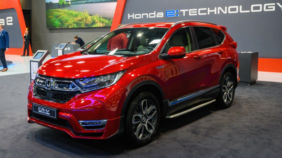 A red Honda CR-V SUV is on display.