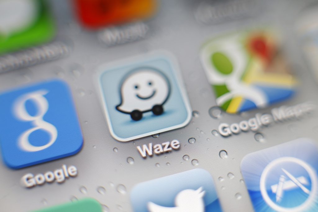An iPhone screen displaying the icon for the Waze navigation app