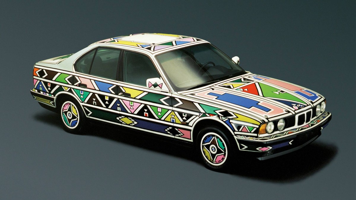 A 3/4 front and overhead view of the Esther Mahlangu painted BMW 525i from 1991.