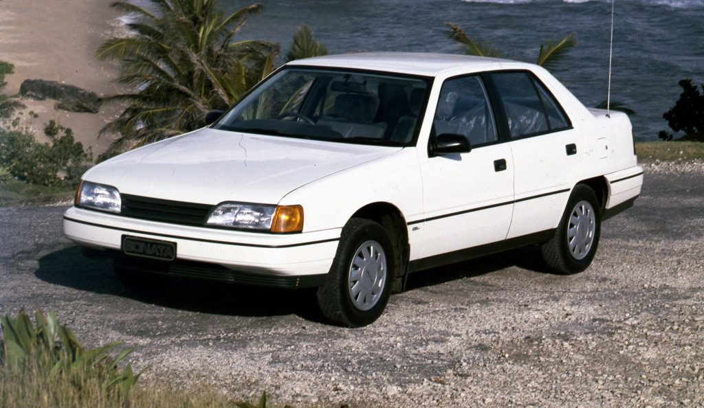 An old white Hyundai.