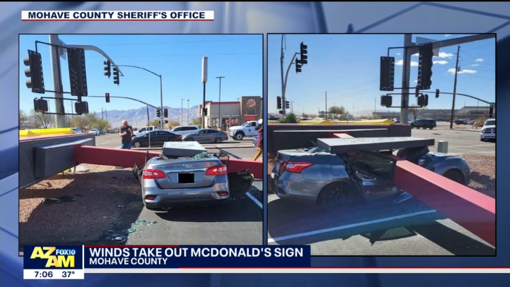 A Nissan Sentra was crushed by a McDonald's sign