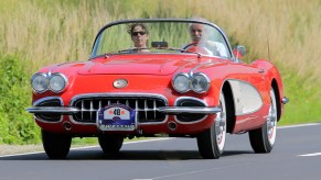 front end shot of 1959 Chevrolet Corvette driving down the road