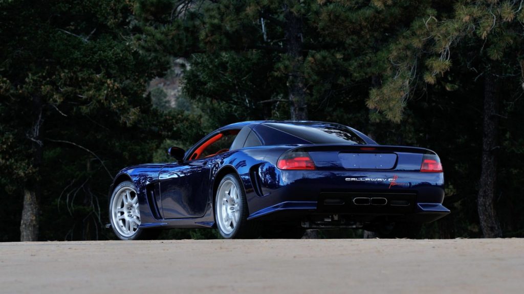 The rear 3/4 view of a blue 1997 Callaway C12