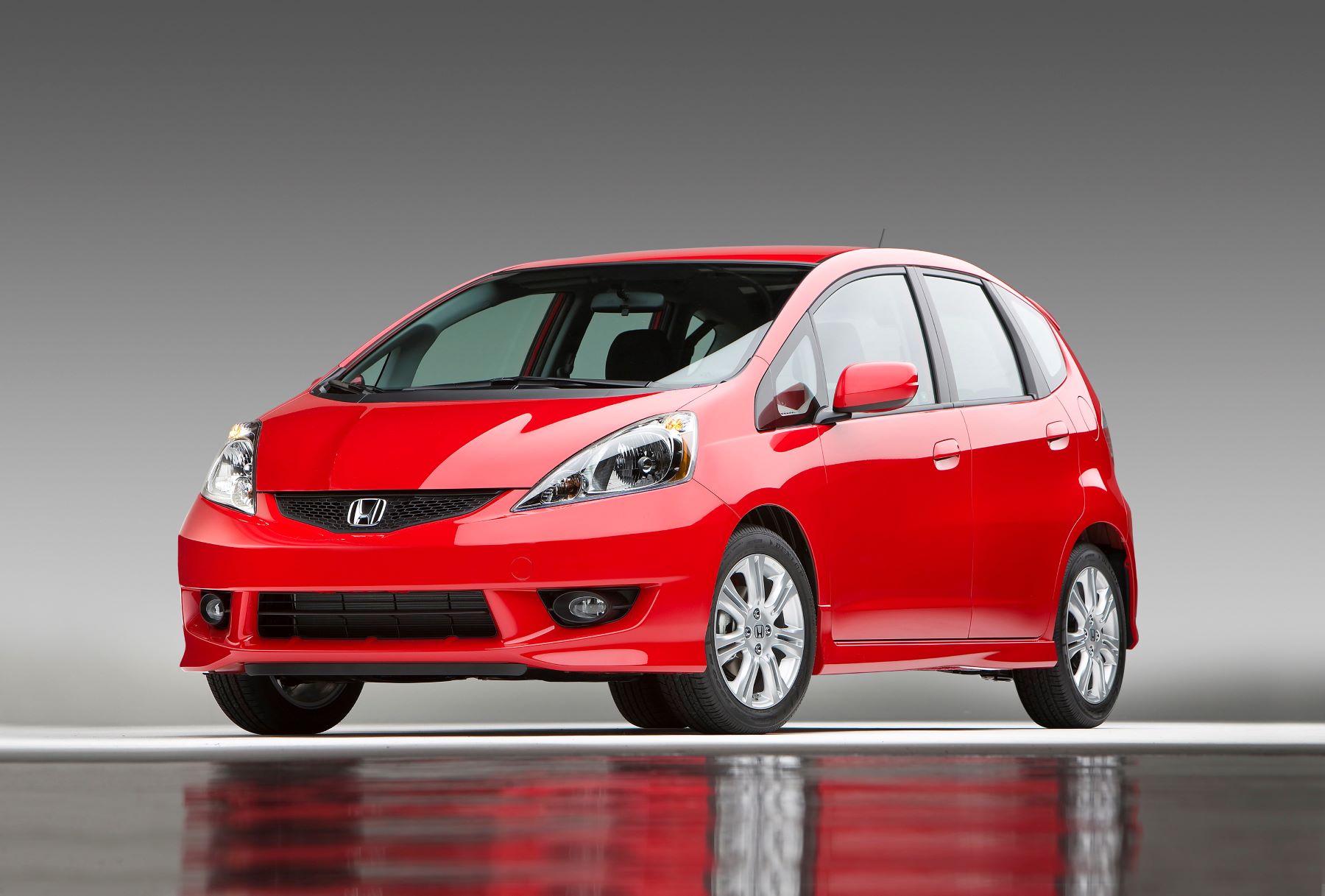 2011 Honda Fit Sport subcompact hatchback model in red