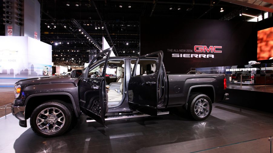 A 2014 GMC Sierra 1500 at an autoshow. It's one of the model years to avoid buying.