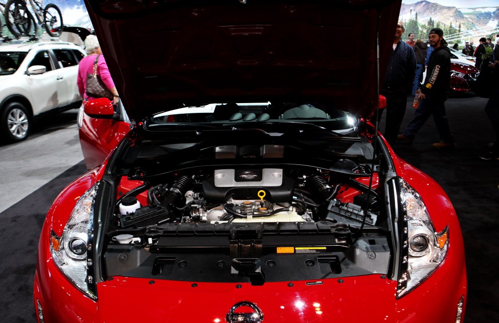 The VQ37VHR V6 inside a red 2016 Nissan 350Z