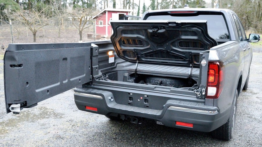2017 Honda Ridgeline with open tailgate and bed storage section