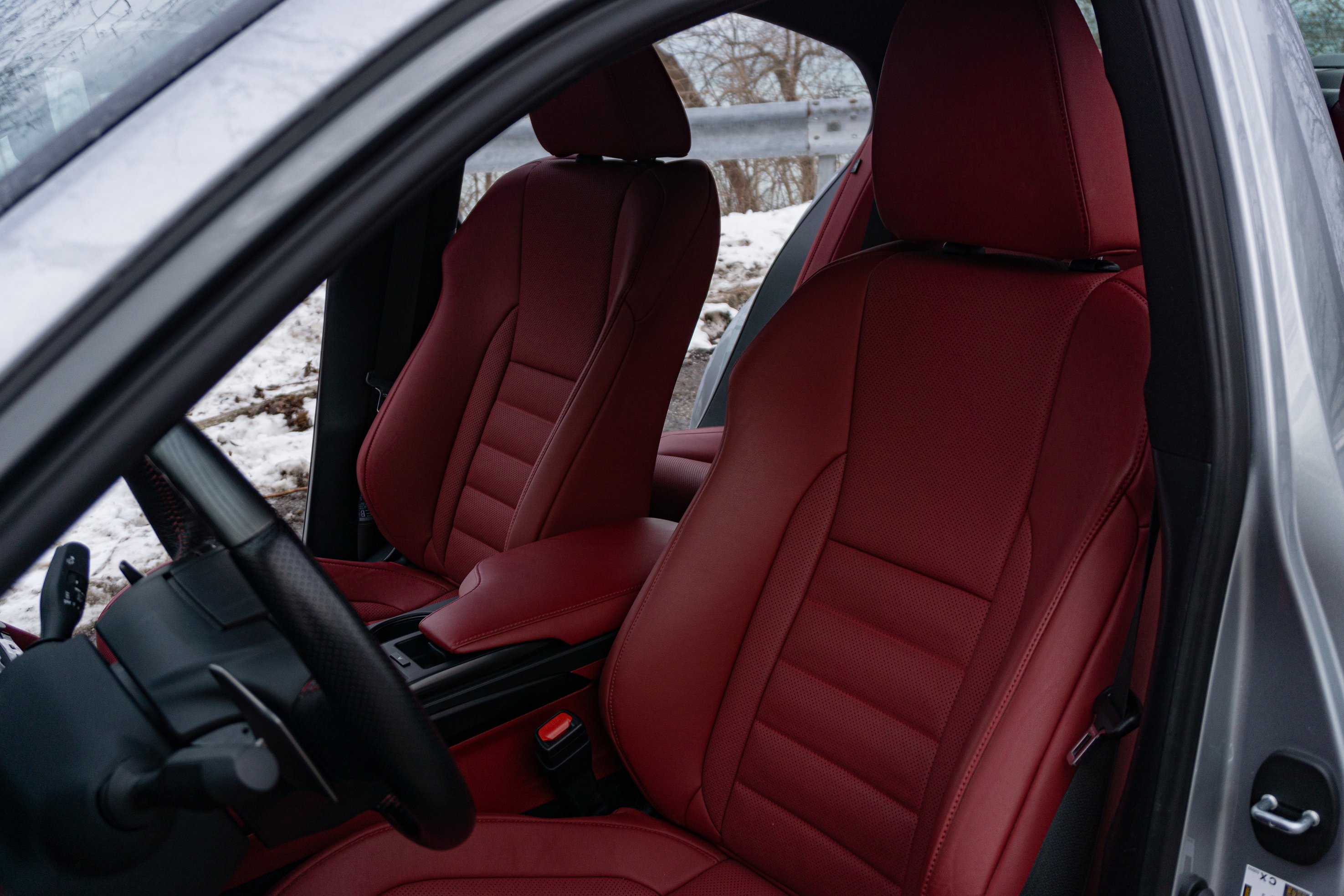 A silver 2021 Lexus IS 350 AWD F Sport with Dynamic Handling Package's red front seats