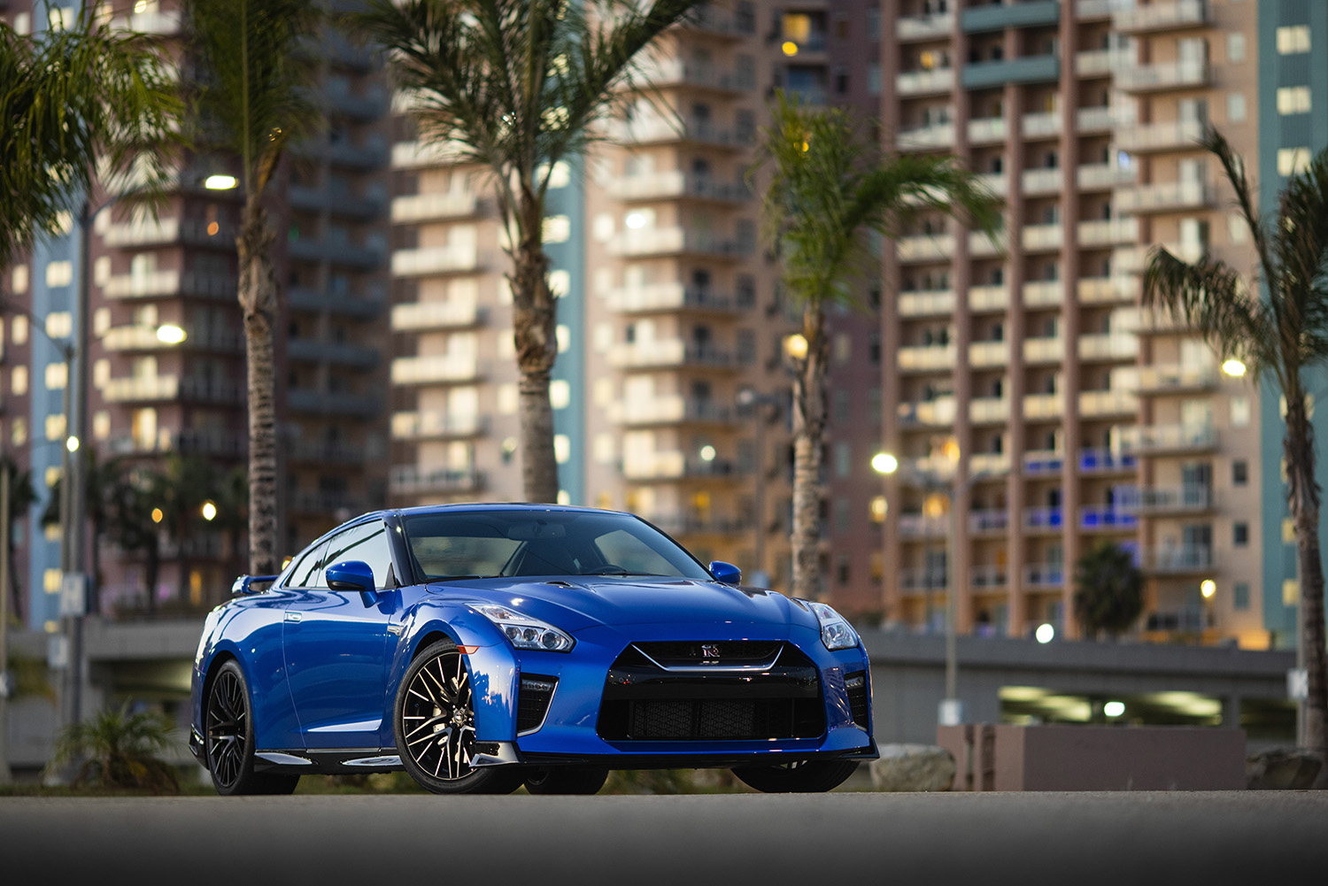 Blue 2021 Nissan GT-R in cityscape shot from front