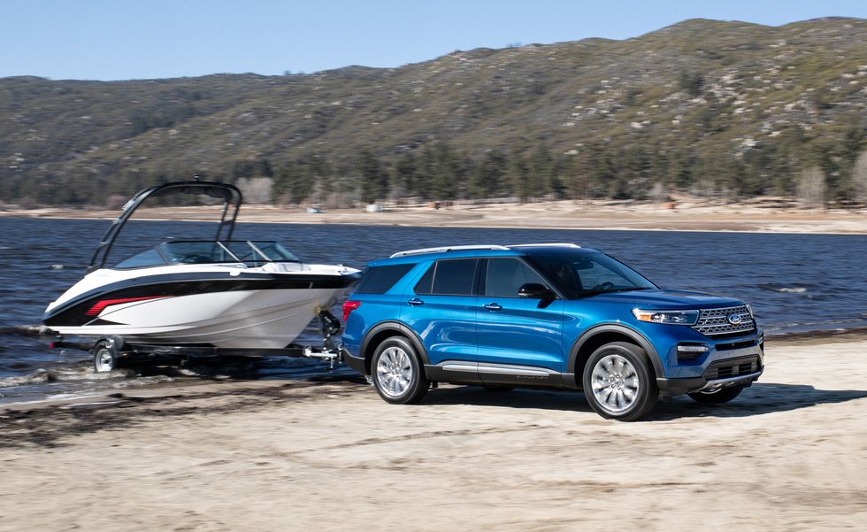 The 2021 Ford Explorer Hybrid towing a boat 