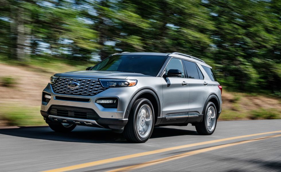 The 2021 Ford Explorer driving down the road 