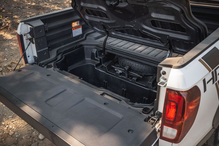 RTL-E and Black Edition 2022 Honda Ridgeline midsize pickup truck models come with truck-bed audio.