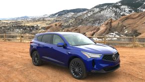 2022 Acura RDX front view against a mountain background