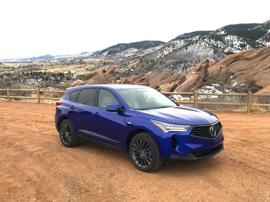 2022 Acura RDX front view against a mountain background