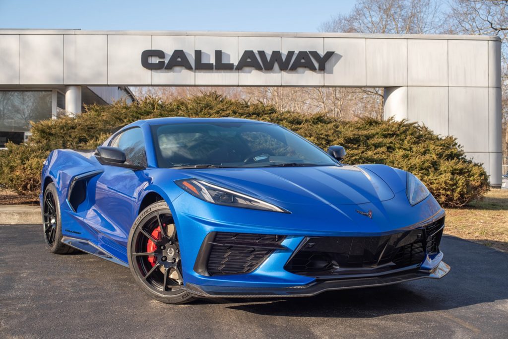 A blue 2022 C8 Callaway Corvette B2K 35th Anniversary Package in front of the Callaway headquarters