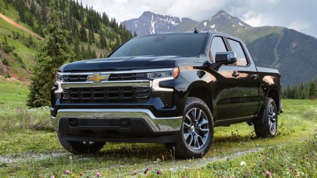 2022 Chevrolet Silverado 1500 High Country in a field - this full-size pickup truck is actually better cheaper.