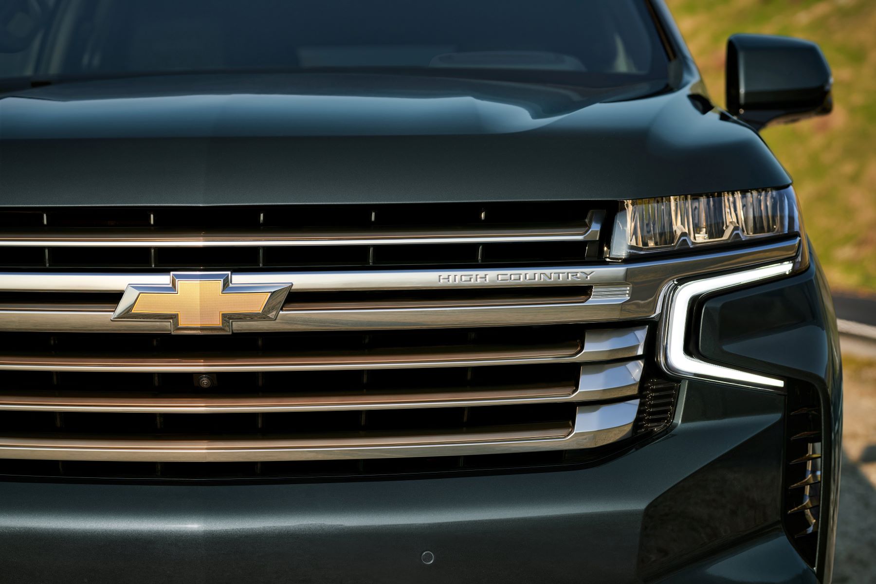 2022 Chevy Tahoe High Country GM SUV front end, grille, and headlights