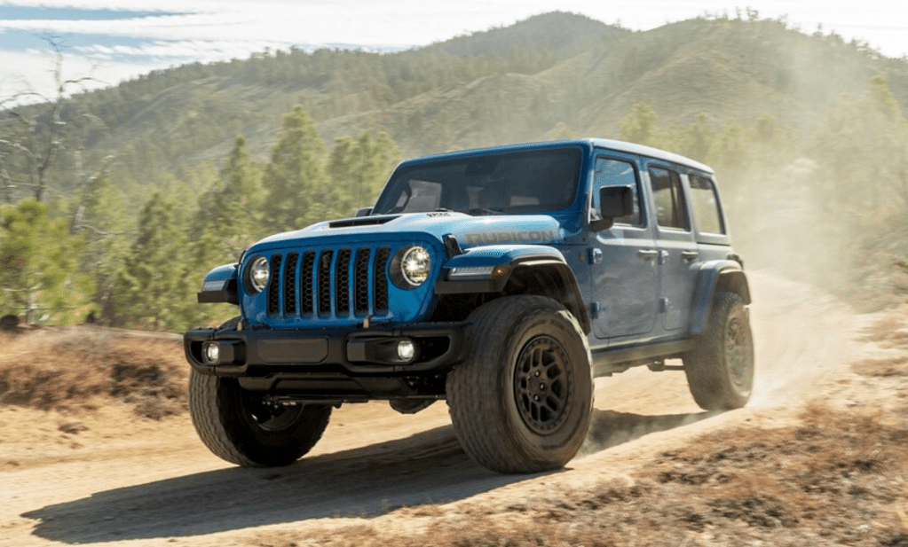 The 2022 Jeep Wrangler Rubicon 392 on a dirt road 