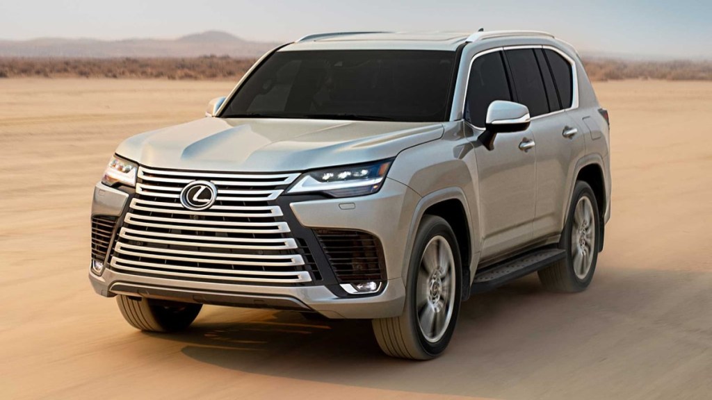 2022 Lexus LX luxury SUV on sand, how much better is it than a 2003 LX470? Throttle House compared them.