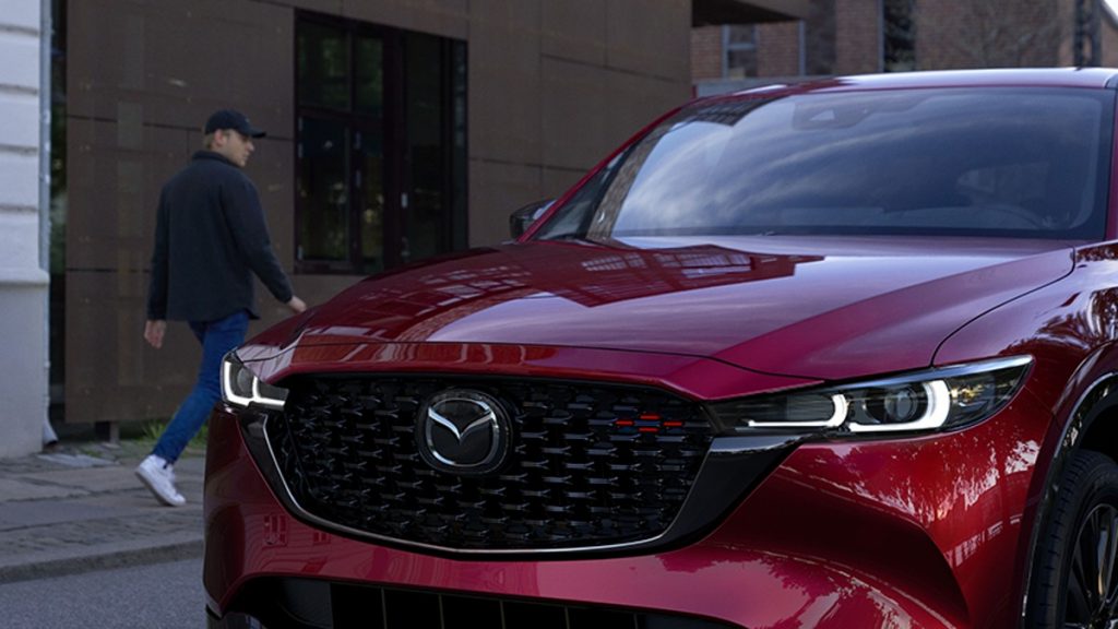 Red 2022 Mazda CX-5 parked on the street