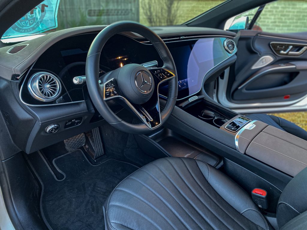 The leather front seats and Hyperscreen dashboard in a 2022 Mercedes-Benz EQS 450+ Premium