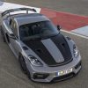 An overhead view of a gray-and-black 2022 Porsche 718 Cayman GT4 RS with the Weissach Package