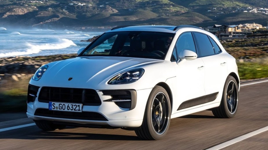 2022 Porsche Cayenne on the road, and it comes in 19 different versions. 