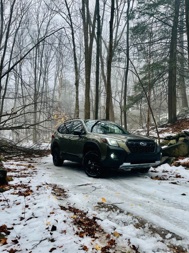2022 Subaru forester Wilderness Edition off-roading on a snowy trail - pros and cons of owning the SUV