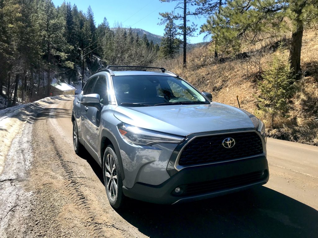 Front corner of the 2022 Toyota Corolla Cross on a dirt road