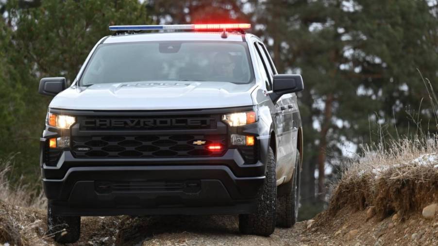 The 2023 Chevy Silverado Police Pursuit truck in the woods