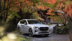 2023 Mazda CX-60 parked near a home