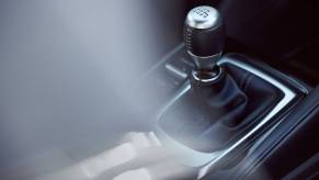 Close up view of a manual transmission shifter in the cabin of the 2023 Acura Integra A-Spec w/Technology Package