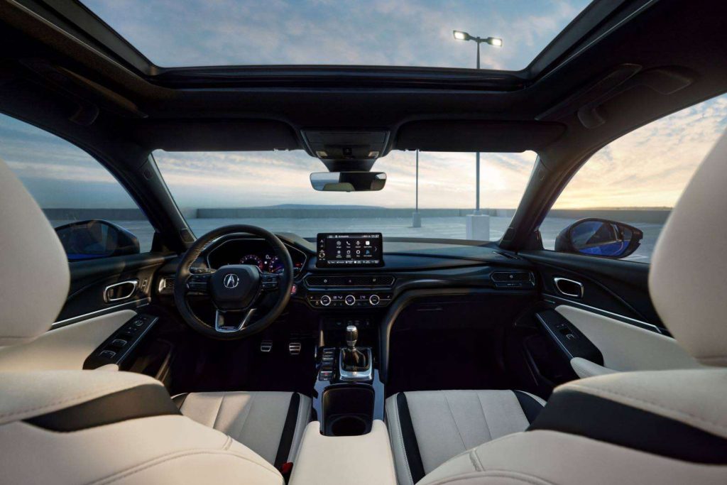 2022 Acura Integra interior features, including beige upholstery and moonroof