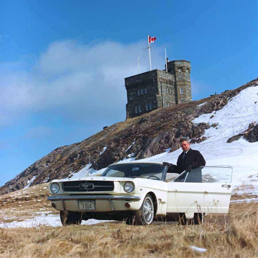 Captain Stanley Tucker with the first Ford Mustang ever built in 1964