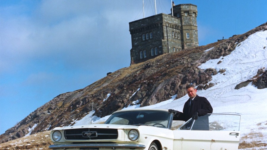 Captain Stanley Tucker with the first Ford Mustang ever built in 1964