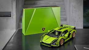 Lamborghini Sian Lego Technic green model on table displayed with its box